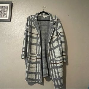 Plaid gray cardigan.